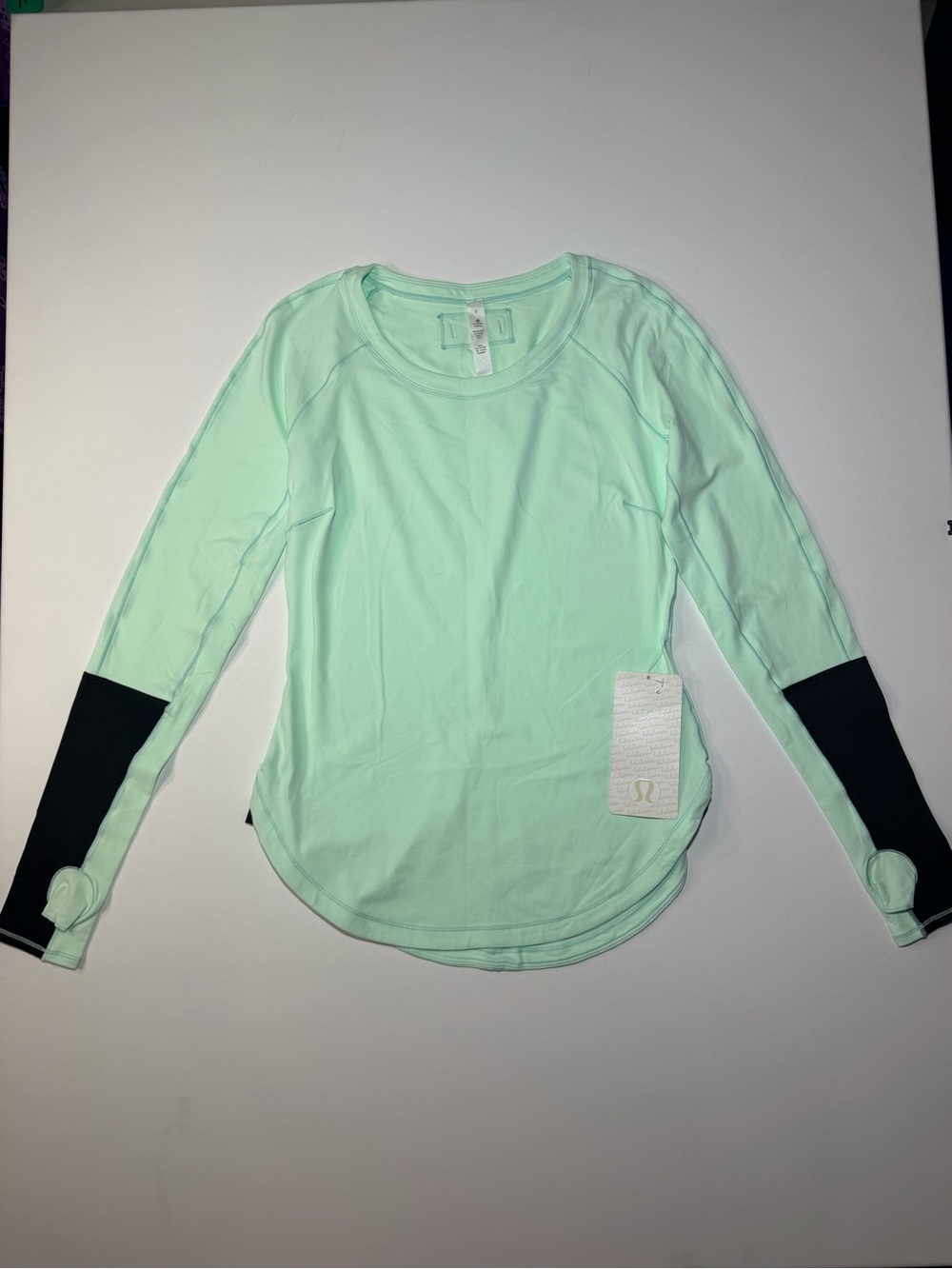 lululemon athletica Mint Long-Sleeve Performance Top with Black Sleeve size 6